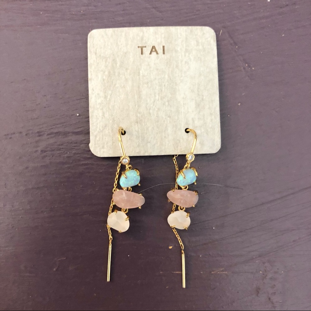 Tai dangle earrings